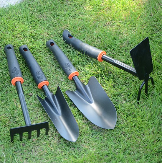 Kleine schepjesset voor het planten van groenten, bloemen en vetplanten.Tuinschep van Merkloos	