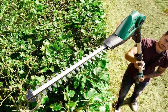 WOLFGANG 2 in 1 kettingzaag en heggenschaar - Telescopische kettingzaag op batterijen 180mm snede - elektrische heggenschaar 14mm diameter - zonder snoer - schuine kop - 20V - (geleverd zonder accu en lader) van Merkloos	